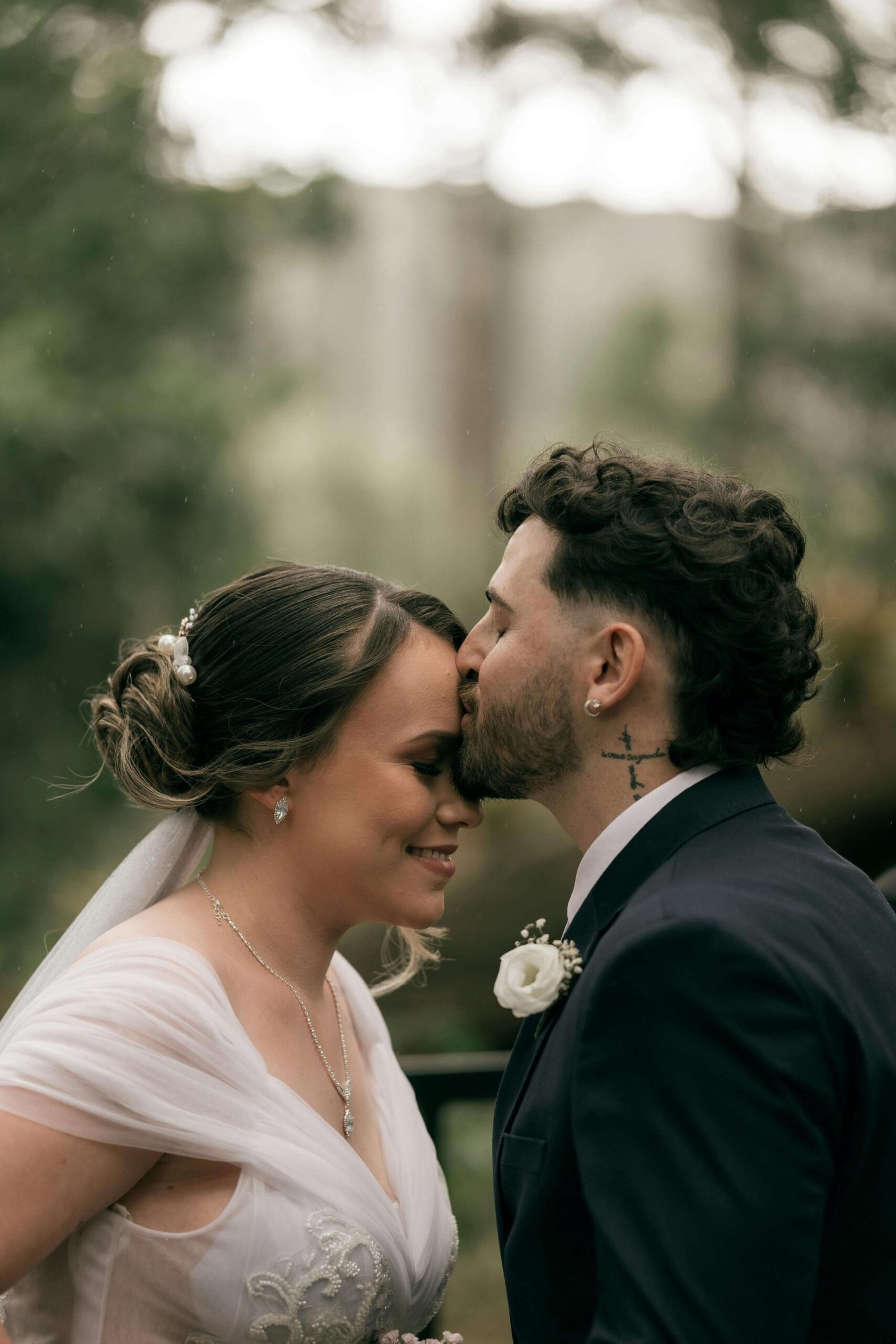 Bride and groom in intimate moment after ceremony, illustrating formal marriage versus what is common law marriage in Texas which requires no wedding