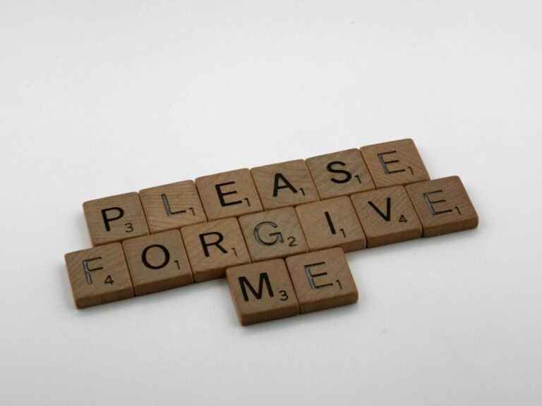 Heartfelt apology spelled out in wooden letter tiles for boyfriend relationship conflict resolution